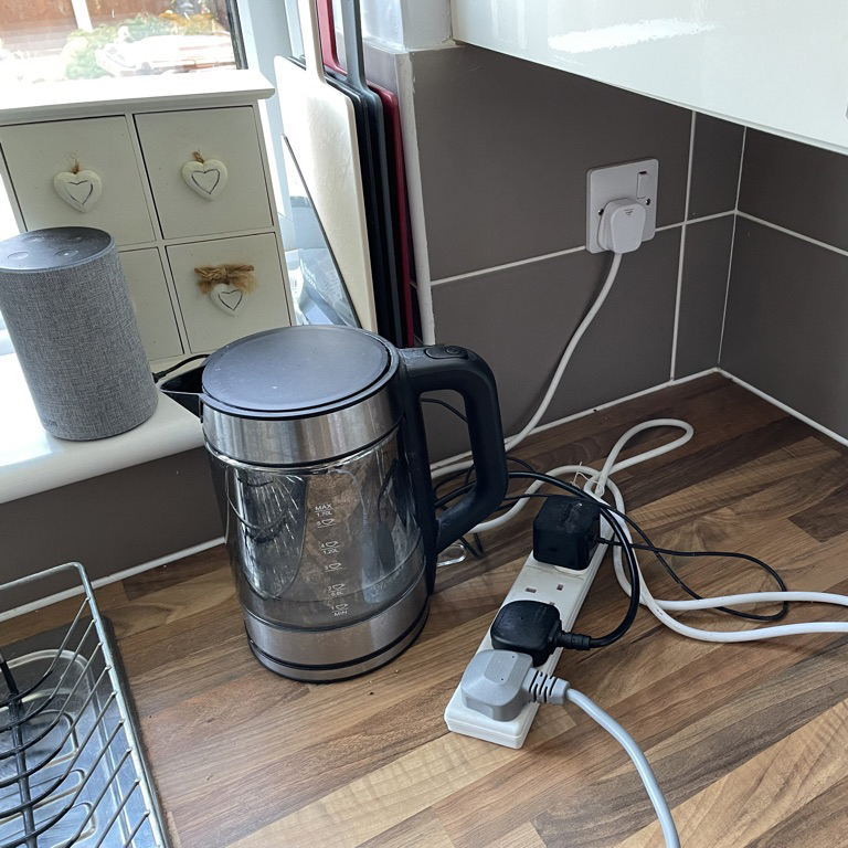 various appliances powered by an extension lead attached to a single plug socket