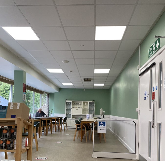 After picture with bright white ceiling lights