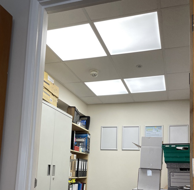 After picture with bright white ceiling lights